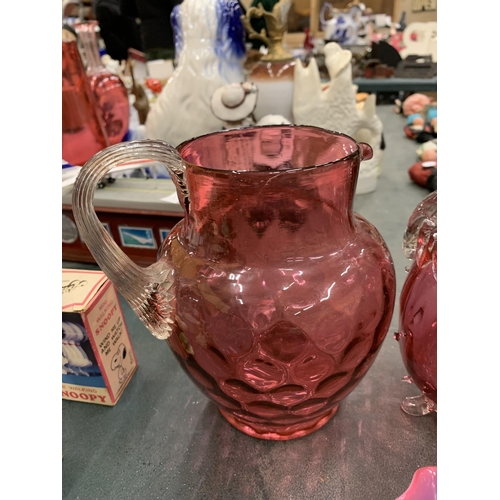 227 - A LARGE QUANTITY OF CRANBERRY GLASS TO INCLUDE JUGS, GLASSES, BOWLS, ETC