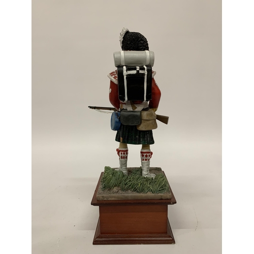 244 - A DANBURY MINT FIGURE OF A CRIMEAN WAR SOLDIER HEIGHT 32CM