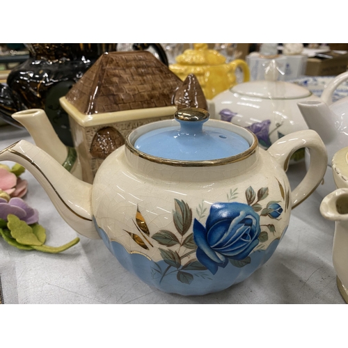 277 - A QUANTITY OF TEAPOTS TO INCLUDE BURLEIGHWARE, SADLER, POOLE, ETC PLUS MUGS