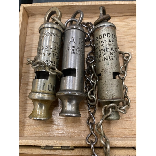 296 - SIX VINTAGE POLICE WHISTLES, TWO WITH CHAINS