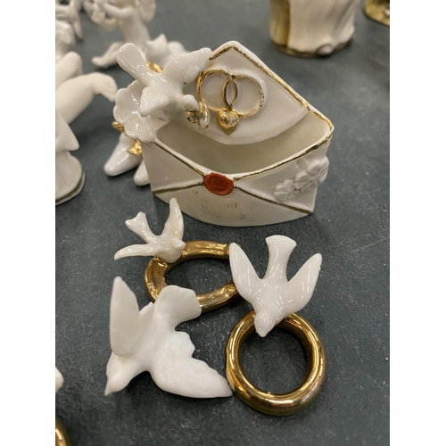 300 - A LARGE QUANTITY OF WHITE CERAMIC MINIATURE FIGURES TO INCLUDE CHERUBS, SHOES, DOVES, ANGELS, ETC