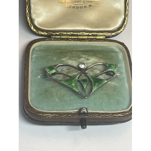 409 - A CHARLES HORNER CHESTER SILVER AND ENAMELLED BROOCH IN A PRESENTATION BOX