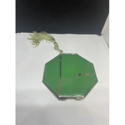 421 - A BRITISH MADE  ART DECO GREEN AND CHROME COMPACT WITH BEAUTIBOX PAD AND A  TASSEL UNUSED AS NEW