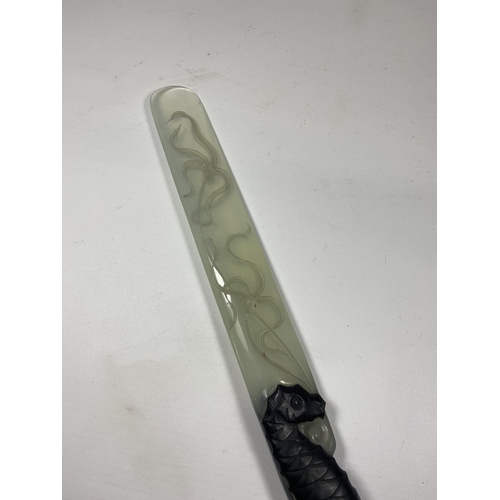 345 - A JADE TYPE ORIENTAL HARDSTONE PAGE TURNER / LETTER OPENER, WITH SEAHORSE DESIGN HANDLE