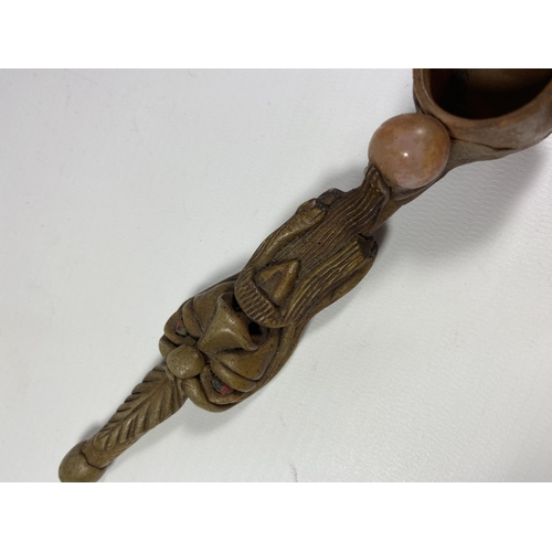 351 - AN ORNATE ORIENTAL PIPE