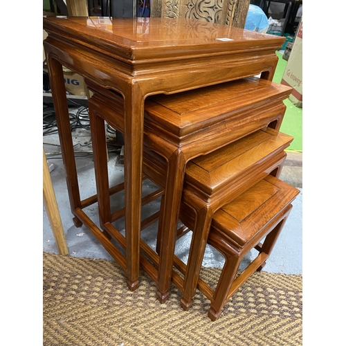 358 - A SET OF FOUR CHINESE YEW WOOD NEST OF TABLES, 65 X 50 X 34.5CM