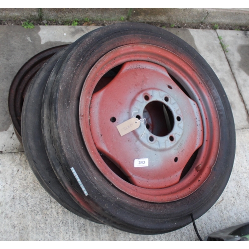 343 - TWO SIX STUD WHEELS AND TYRES AND A FURTHER SIX STUD RIM NO VAT