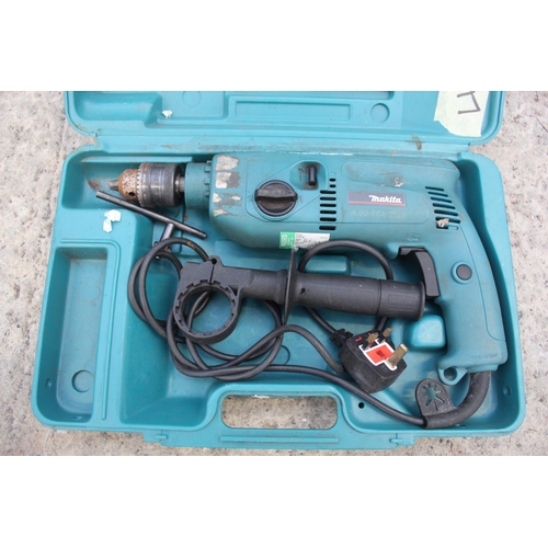 92 - A MAKITA ELECTRIC DRILL PLUS VAT