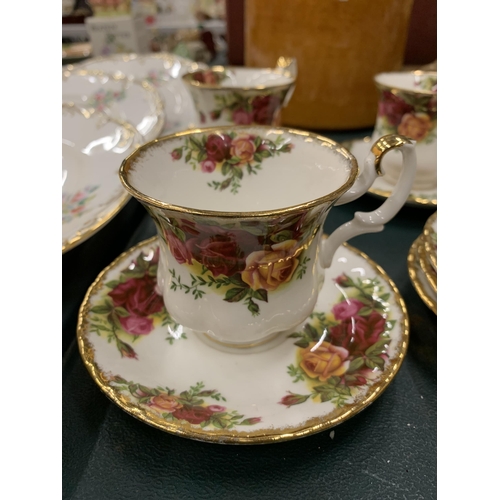 112 - A QUANTITY OF ROYAL ALBERT 'OLD COUNTRY ROSES' TO INCLUDE CUPS, SAUCERS, SUGAR BOWL AND CREAM JUG