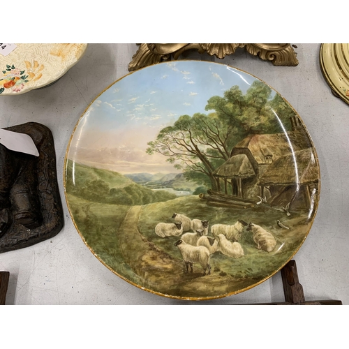 211 - A HANDPAINTED COPELAND WALL CHARGER WITH AN IMAGE OF SHEEP - DIAMETER 31CM