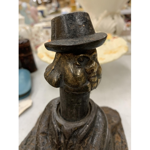 213 - A VINTAGE CAST DOORSTOP OF A MAN WITH A CARVING KNIFE