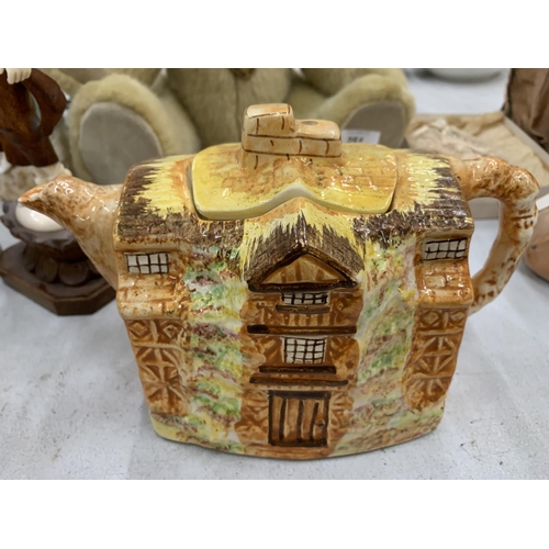 250 - TWO PIECES OF ARTHUR WOOD COTTAGE WARE TO INCLUDE A TEAPOT AND A BISCUIT BARREL
