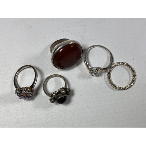 658 - FIVE ASSORTED SILVER RINGS