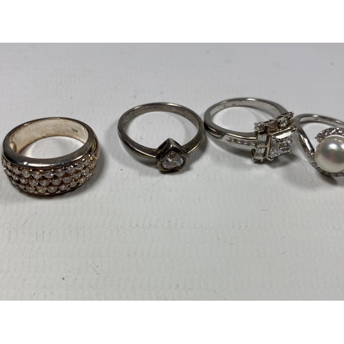 672 - FIVE ASSORTED SILVER RINGS