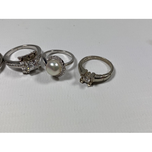 672 - FIVE ASSORTED SILVER RINGS