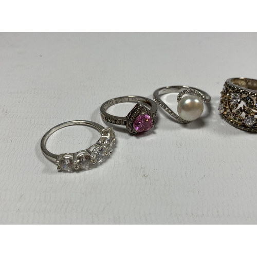 673 - FIVE ASSORTED SILVER RINGS