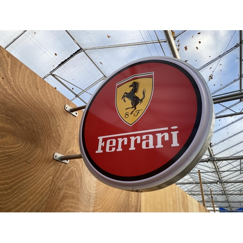 1219 - AN ILLUMINATED CIRCULAR DOUBLE SIDDED FERRARI WALL SIGN