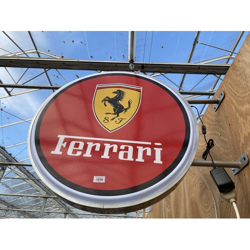 1219 - AN ILLUMINATED CIRCULAR DOUBLE SIDDED FERRARI WALL SIGN