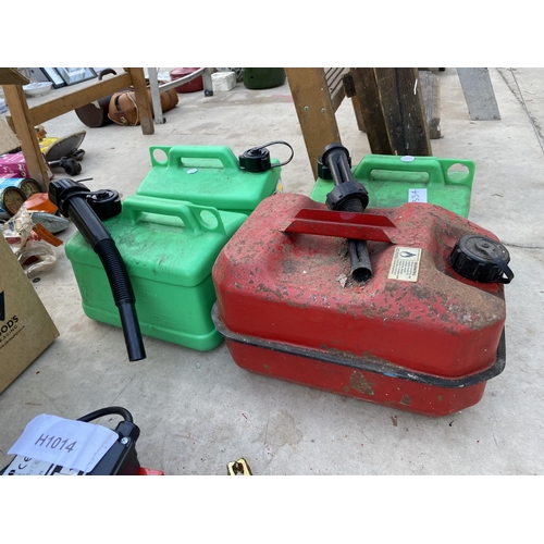 1334 - THREE PLASTIC FUEL CANS AND A FURTHER METAL FUEL CAN