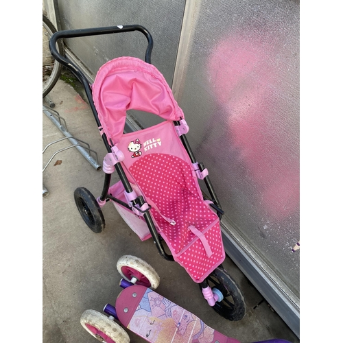 A HELLO KITTY PUSH CHAIR AND TWO GIRLS SCOOTERS