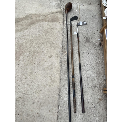 1379 - THREE VINTAGE GOLF CLUBS