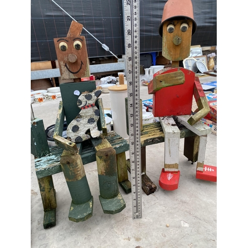 1722 - THREE WOODEN SCRATCH BUILT GARDEN FIGURES