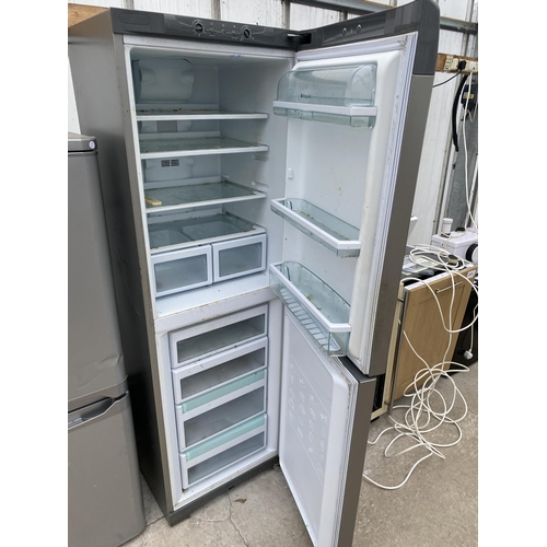 2062 - A SILVER HOTPOINT UPRIGHT FRIDGE FREEZER