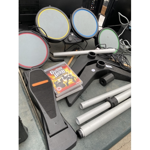 2080 - A PLAYSTATION DRUM KIT AND TWO GAMES TO INCLUDE GUITAR HERO WORLD TOUR