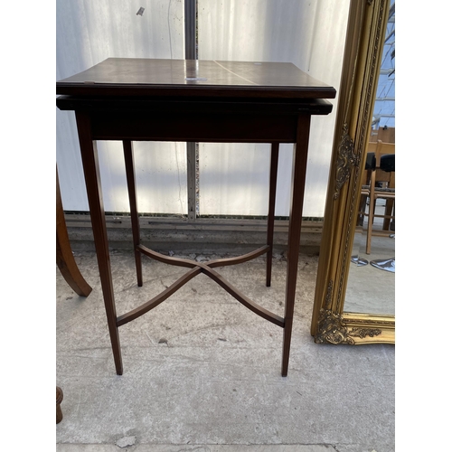 2242 - AN EDWARDIAN MAHOGANY AND CROSSBANDED FOLD-OVER GAMES TABLE, 27.5X18