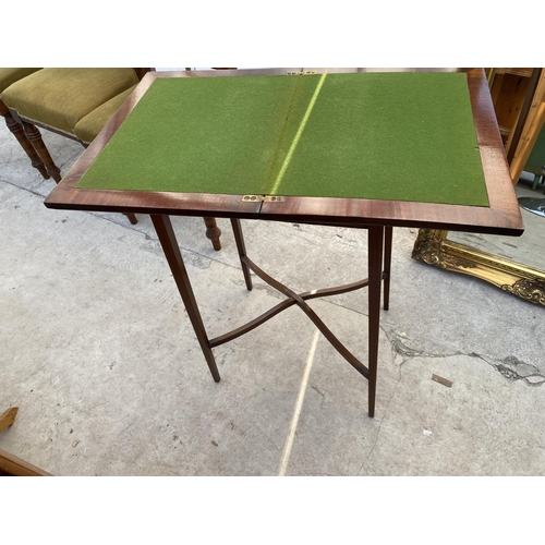 2242 - AN EDWARDIAN MAHOGANY AND CROSSBANDED FOLD-OVER GAMES TABLE, 27.5X18