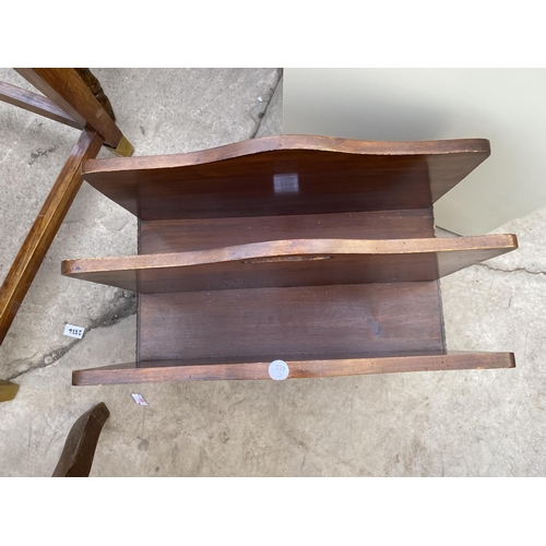 2330 - A MID 20TH CENTURY MAHOGANY TWO DIVISION MAGAZINE RACK ON CABRIOLE LEGS