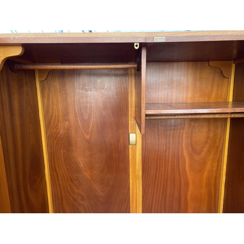 2403 - AN OAK AUSTINSUITE TWO DOOR WARDROBE, 48