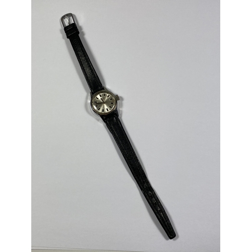 553 - A LADIES ROTARY SWISS WATCH ON BLACK LEATHER STRAP