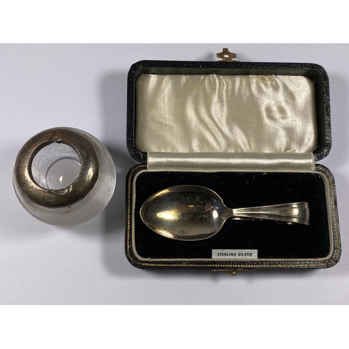 555 - TWO ITEMS - LONDON HALLMARKED SILVER TOPPED MATCH STRIKER AND CASED EPNS SPOON