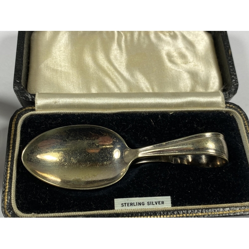 555 - TWO ITEMS - LONDON HALLMARKED SILVER TOPPED MATCH STRIKER AND CASED EPNS SPOON