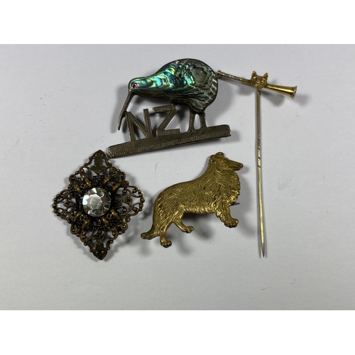 558 - A GROUP OF FOUR ITEMS TO INCLUDE A SILVER & MOTHER OF PEARL NEW ZEALAND BROOCH, KENART DOG BROOCH ET... 