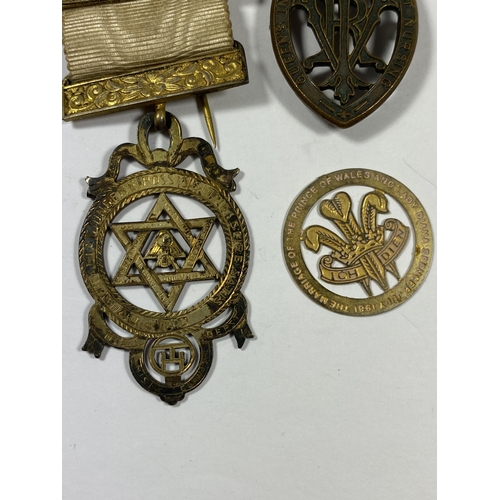 563 - A GROUP OF THREE MEDALS TO INCLUDE A HALLMARKED SILVER GILT MASONIC EXAMPLE