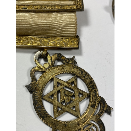 563 - A GROUP OF THREE MEDALS TO INCLUDE A HALLMARKED SILVER GILT MASONIC EXAMPLE