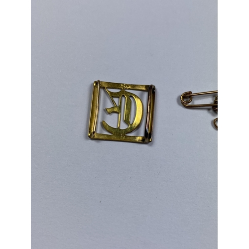 572 - A 9CT YELLOW GOLD SMALL BUCKLE, WEIGHT 0.78G