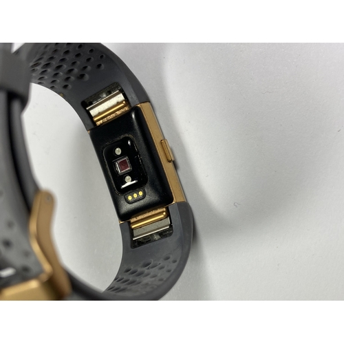 582 - A FITBIT WATCH IN WORKING ORDER