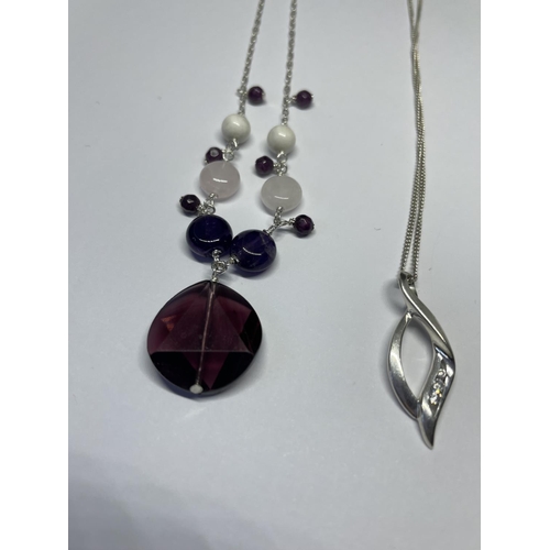 604 - FOUR SILVER NECKLACES WITH PENDANTS