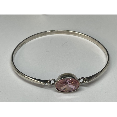 609 - TWO MARKED SILVER BANGLES