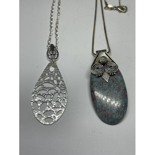 623 - FOUR SILVER NECKLACES WITH PENDANTS