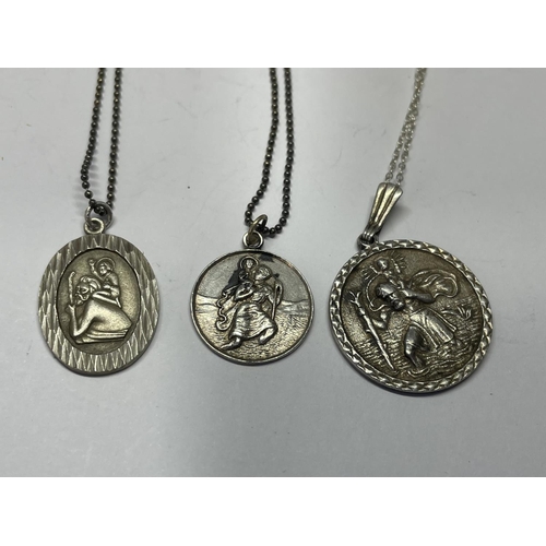 626 - THREE SILVER NECKLACES WITH ST CHRISTOPHER PENDANTS