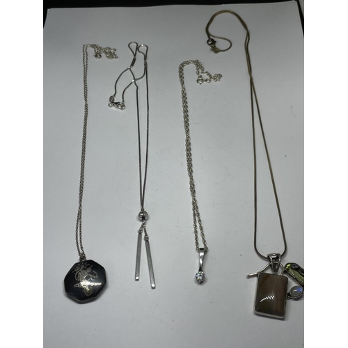 627 - FOUR SILVER NECKLACES WITH PENDANTS