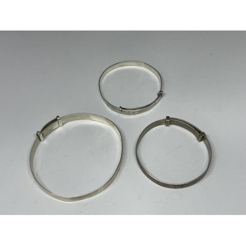 628 - THREE MARKED SILVER BANGLES