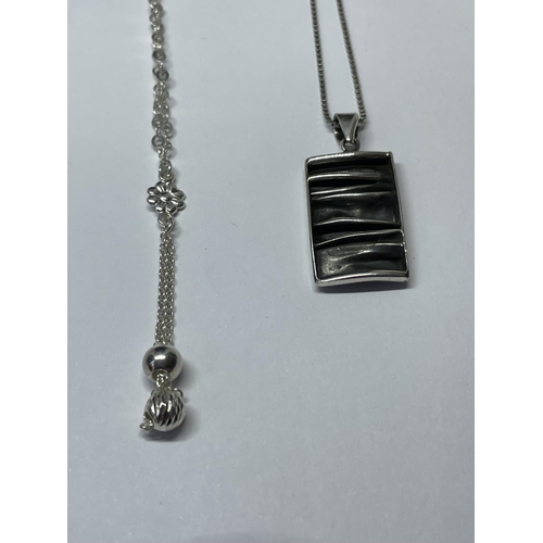 633 - FOUR SILVER NECKLACES WITH PENDANTS