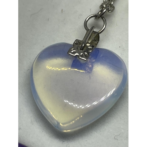 642 - A SILVER NECKLACE WITH A FRENCH GLASS HEART PENDANT IN A PRESENTATION BOX