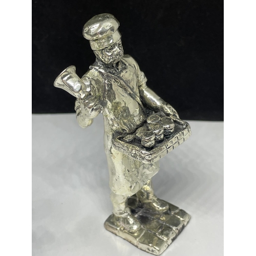 653 - TWO SILVER PLATED FIGURES