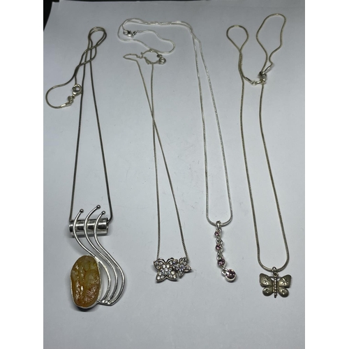 661 - FOUR SILVER NECKLACES WITH PENDANTS